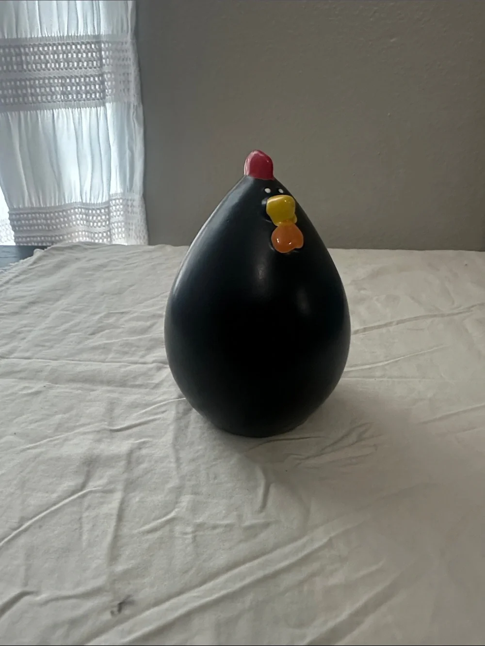 Colorful Rooster Apron with Sunglasses Print and a ceramic rooster. NWT